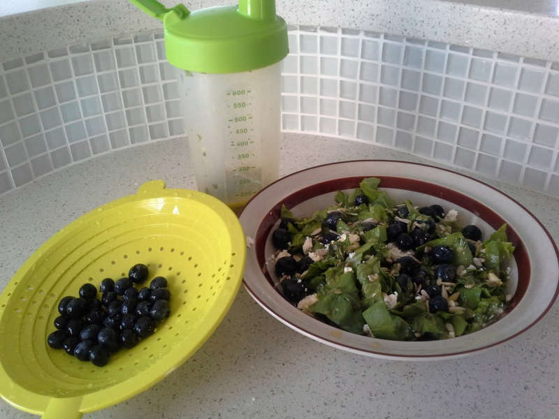 Salad with Basil Vinaigrette Dressing and Blueberries. 