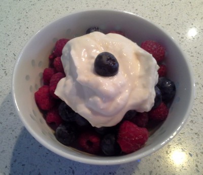 Whipped topping on fresh berries.