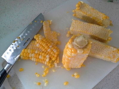 Removing corn from the cob